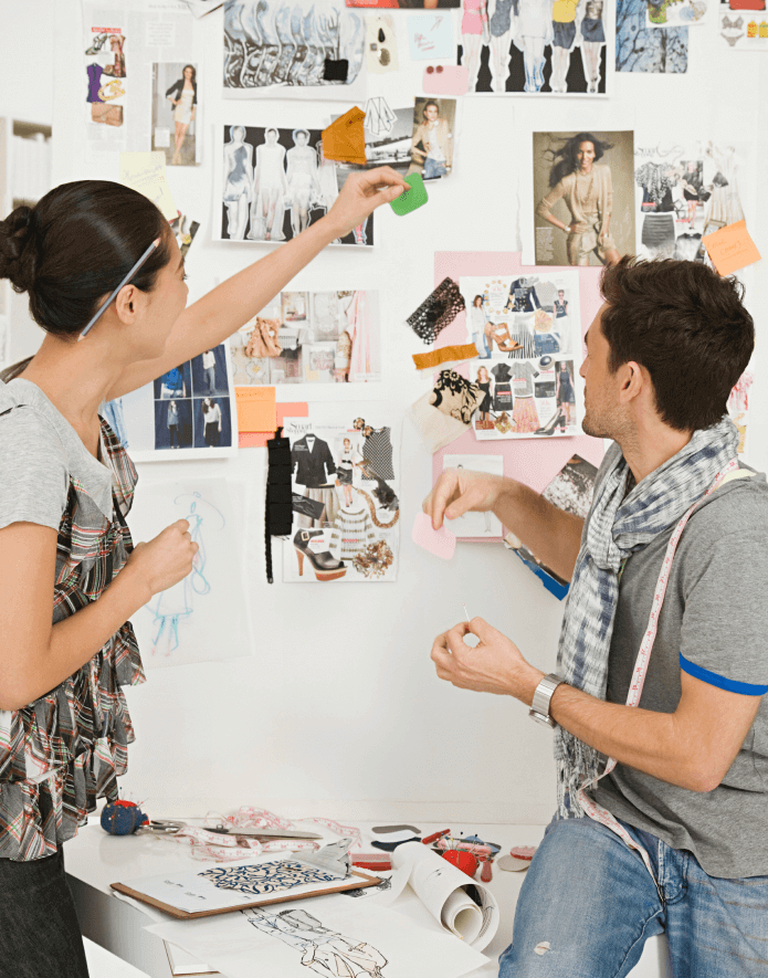 Two creative professionals collaborating on a mood board